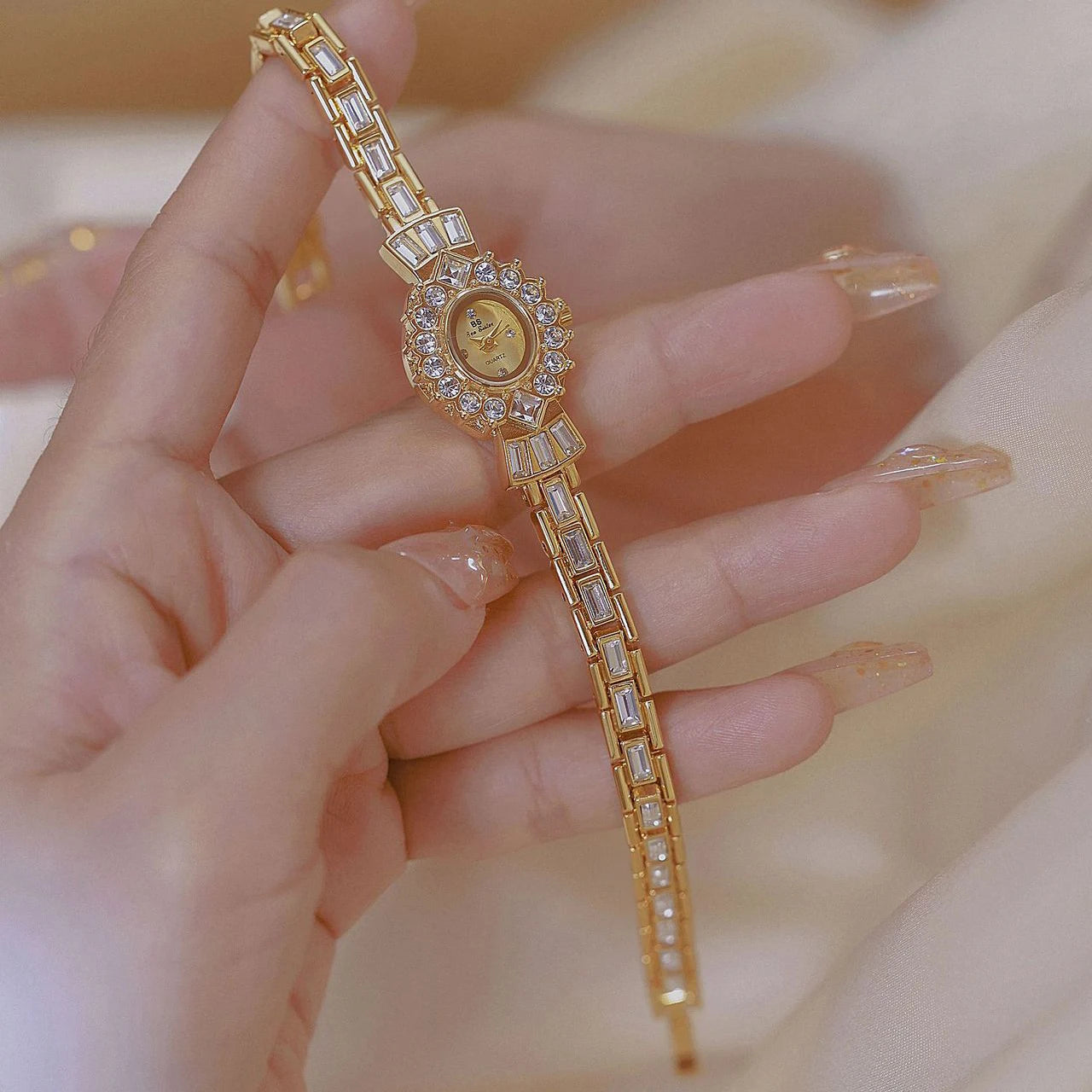 RICH GOLD BRACELET WATCH