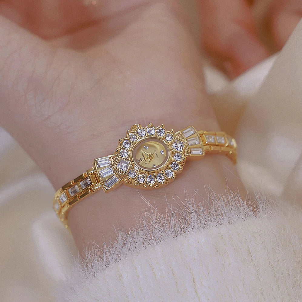 RICH GOLD BRACELET WATCH