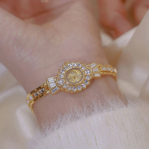 RICH GOLD BRACELET WATCH