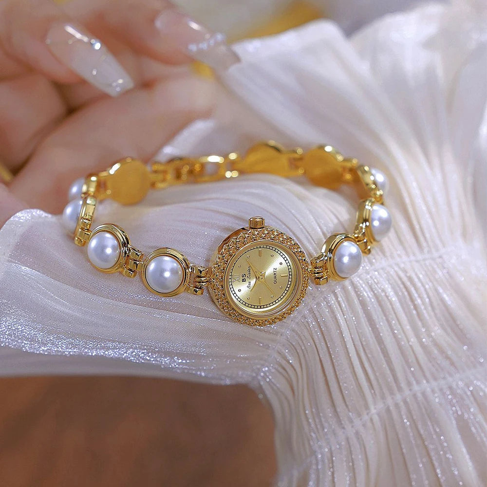 HAUTE GOLD BRACELET WATCH