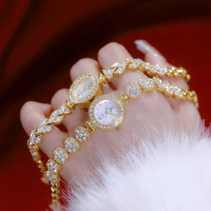 FEMME GOLD BRACELET WATCH