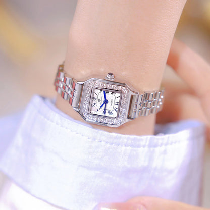 HER GOLD BRACELET WATCH