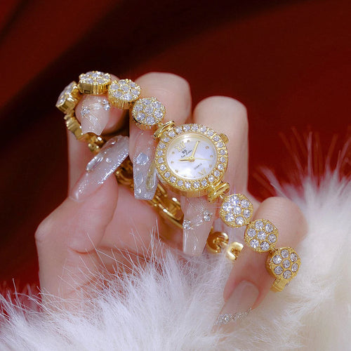 FEMME GOLD BRACELET WATCH